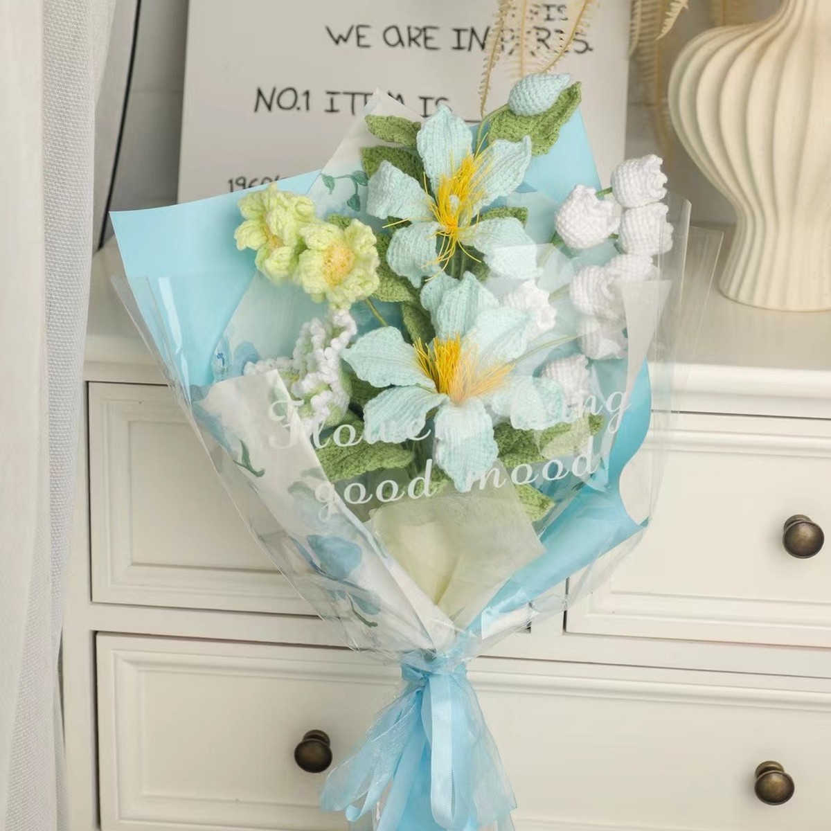 Blue Lily Mini Crochet Bouquet centered in a clean lifestyle product photograph