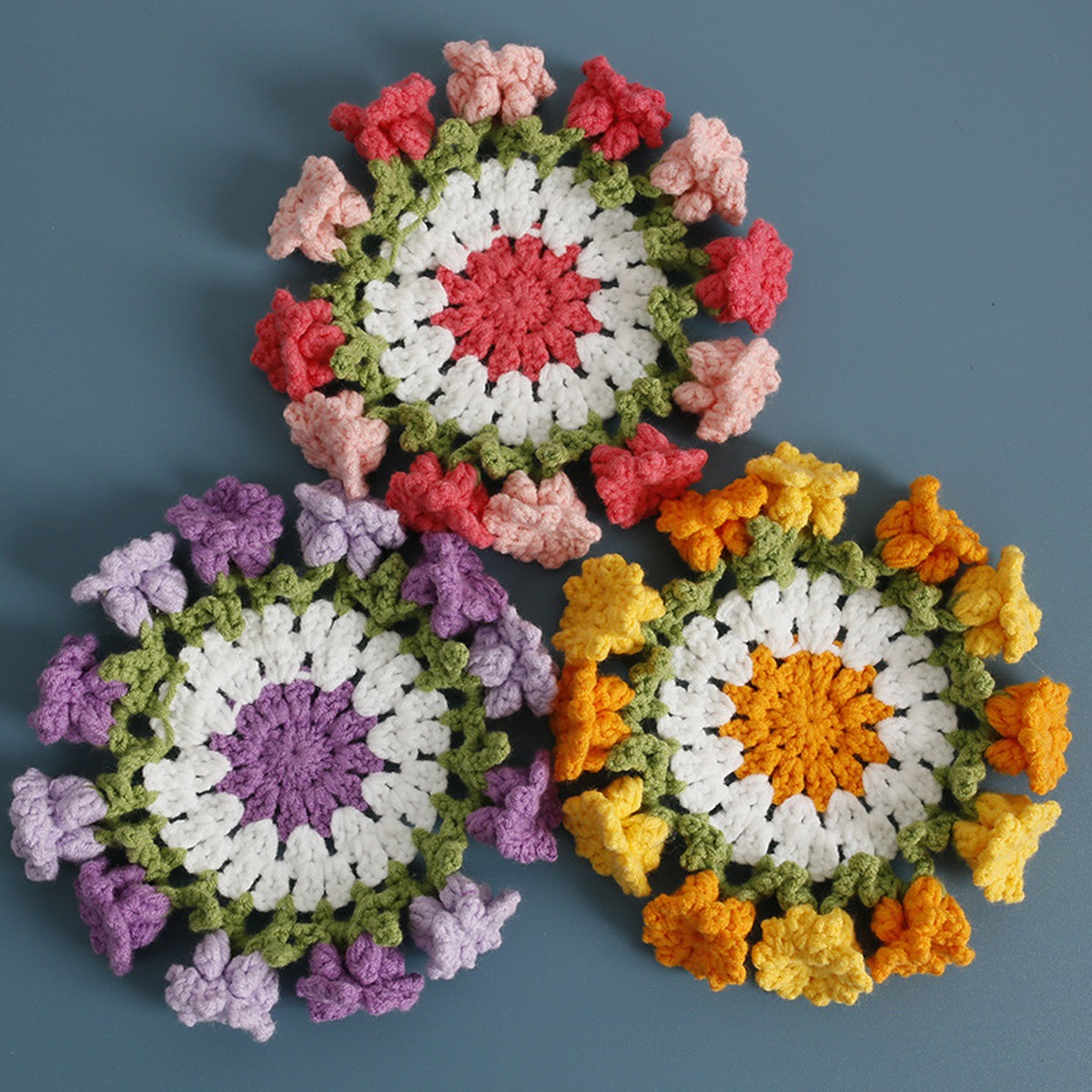 Garden Flower Crochet Coaster Set centered on a clean product background