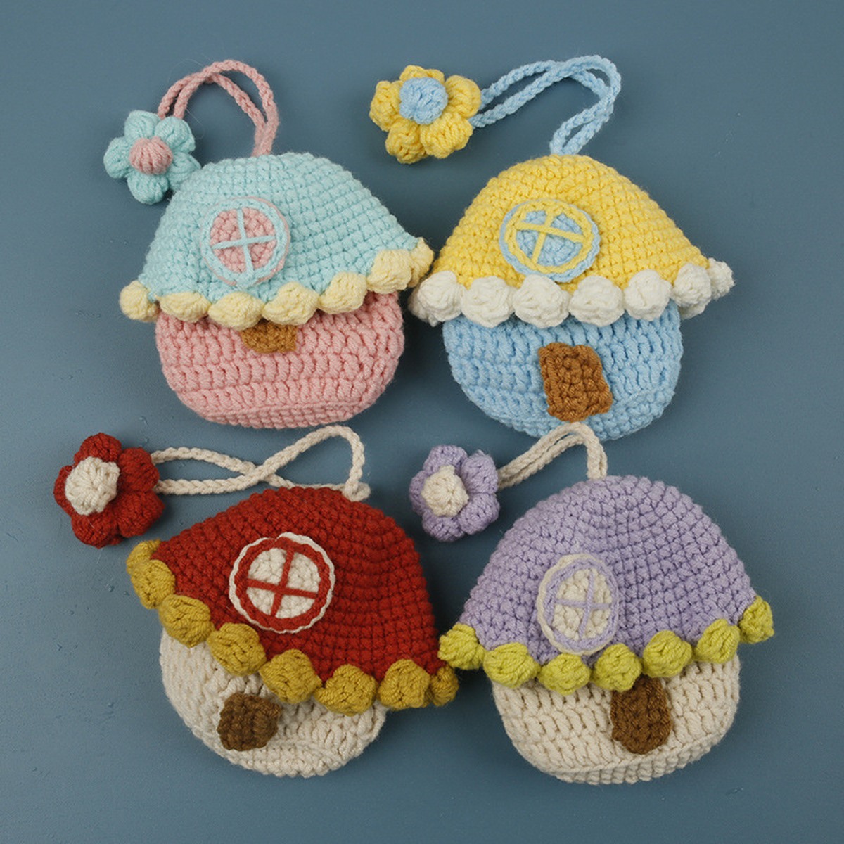 Mushroom House Crochet Keychain centered on a clean product background