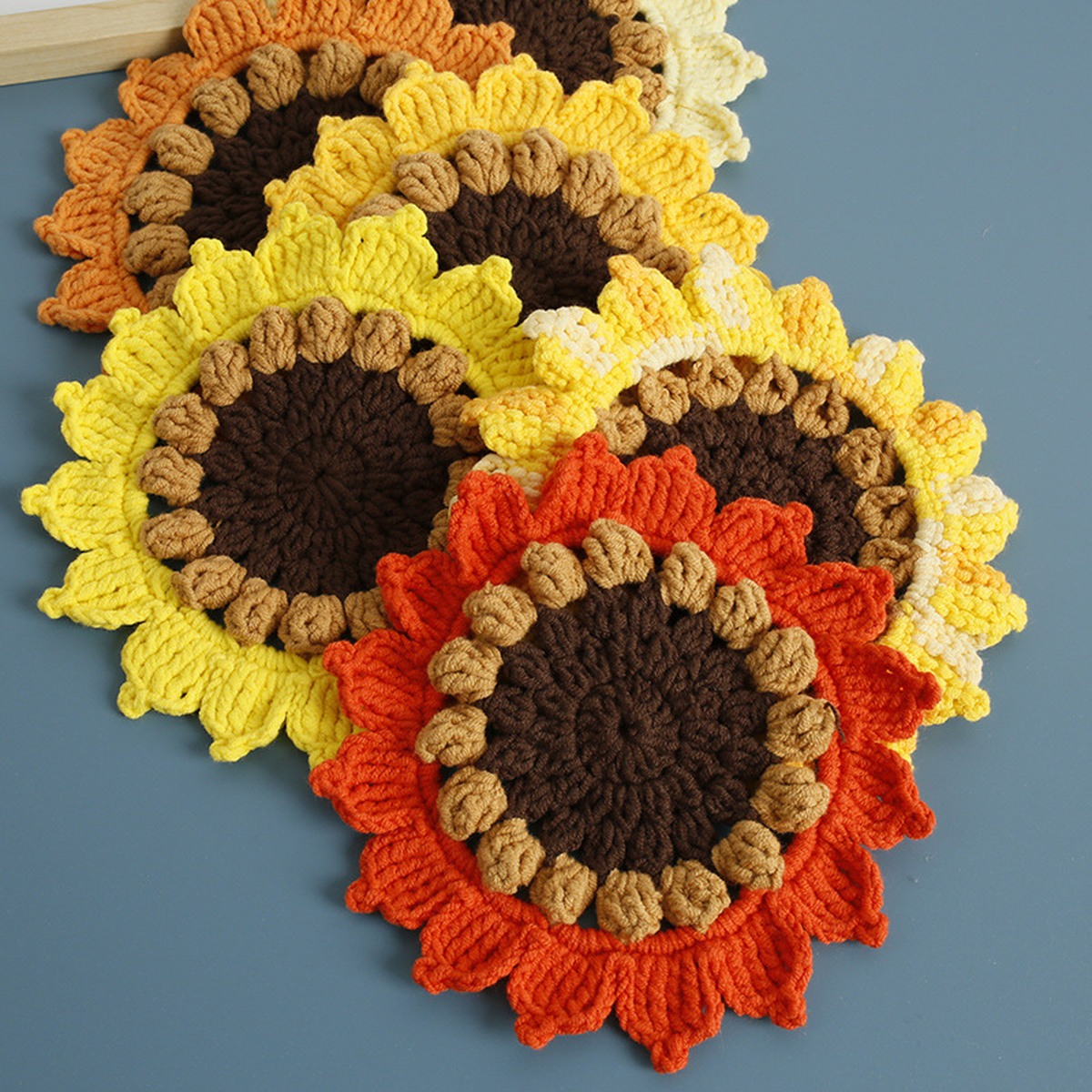 Sunflower Crochet Coaster Set centered on a clean product background
