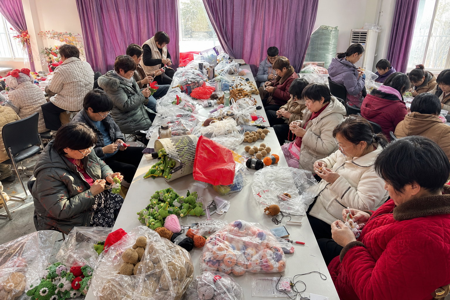 Crochet makers working together around a small-batch production table